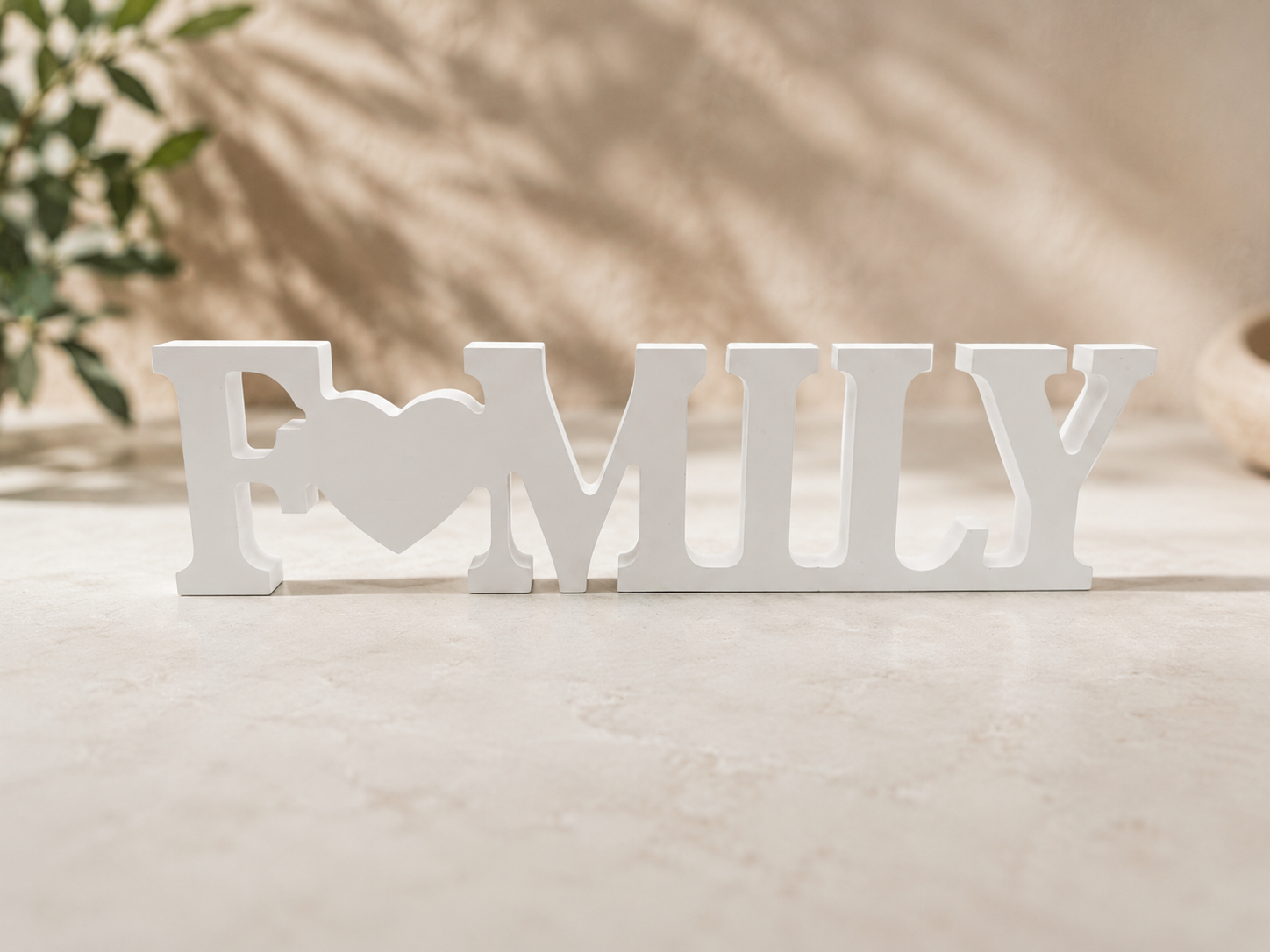 Schriftzug „FAMILY“ mit Herz